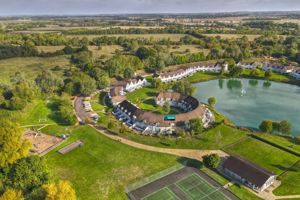 Lodge, tennis court, play area, and parking- click for photo gallery